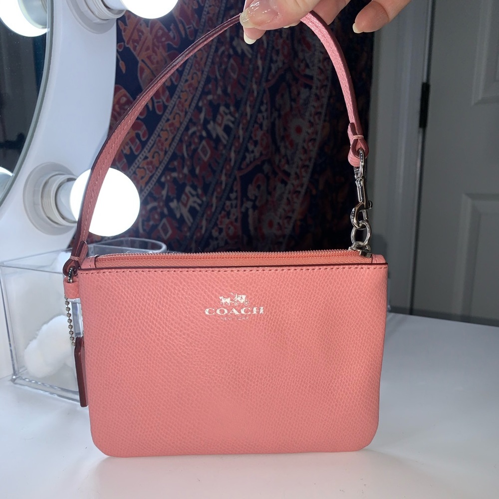 Coach wristlet (pink). Never used.